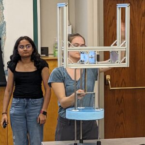 Students demonstrate model for wave energy converter