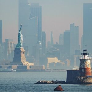 Panorama view of New York city with statue of liberty tomorrow morning at sunrise. View from Staten Island. (iStock)