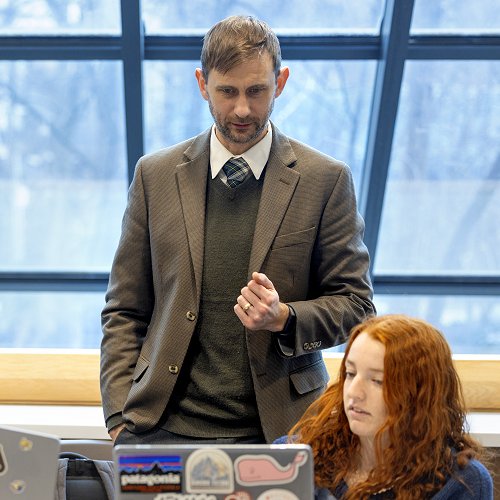 Toby Ault working with a student