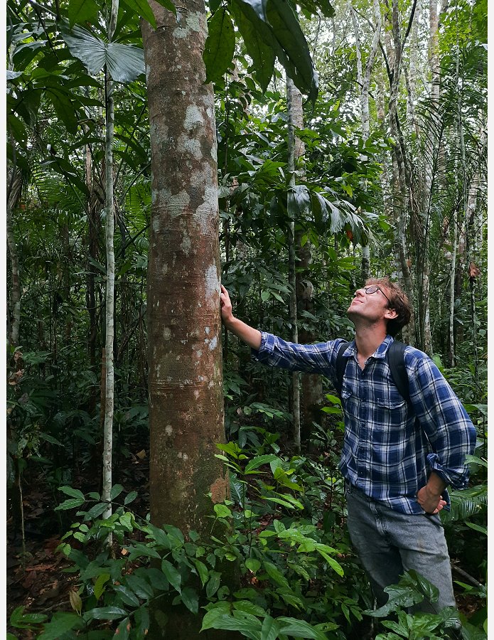 Photo of grad student Charlie Tebbutt in jungle for cover of Cornell Atkinson 2025 Impact Report-WEB