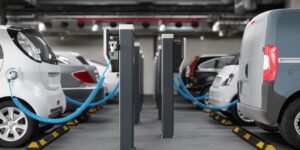 Electric cars charging in a parking garage