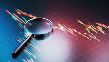 Illustration of magnifying glass overlaid on a line graph
